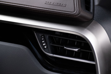 Fototapeta na wymiar Modern luxury car air vents.
