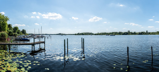 Fototapety  panoramic shot of Havel River near Heiligensee, Berlin on sunny summer day