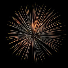 explosion of an isolated firework leaves a trail of orange light