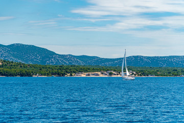 Lonely Yacht sailing on opened sea, Croatia