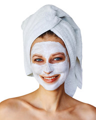 Young woman with facial mask on her face. Skin care and treatment, spa, natural beauty and cosmetology concept, isolated over white background