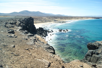 A view of Piedra beach at the quiet fishing village of El Cotillo on the island of Fuerteventura in the Canary islands.