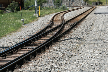 close up of a narrow gauge railroad track switch