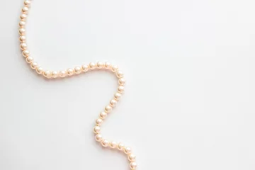 Pearls on white background © iryna1