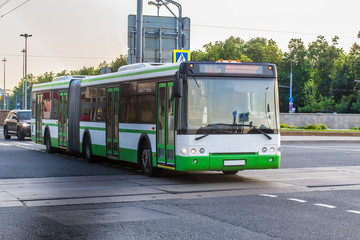 Bus Moving Down The Street