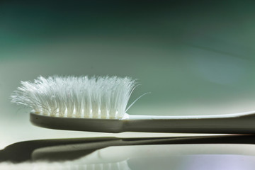 Old white toothbrush that has been used for too long Should change For good dental health