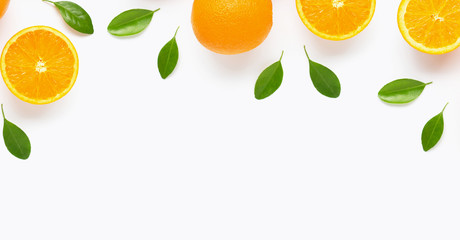 Fresh orange citrus fruit with leaves isolated on white background.