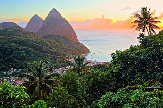 Tropical landscape with view of the village and the two Pitons, Gros Piton 770m and Petit Piton 743m, evening sun, Soufriere, St. Lucia, Lesser Antilles, West Indian Islands, Caribbean Sea