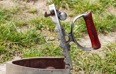 Open empty old iron, cordless working on coals