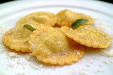 Italian food recipes Ravioli pasta stuffed with ricotta cheese and cinnamon