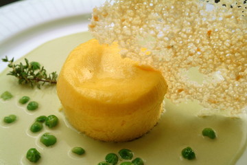 Italian food recipes, Parmesan cheese flan with peas cream.