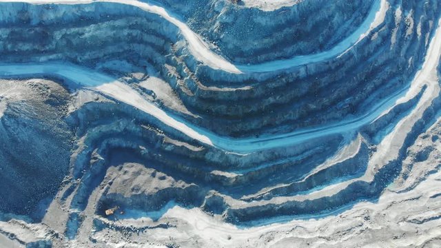 Aerial view of the open pit quarry. Open-pit, open-cast or open cut mining, extracting rock or minerals.