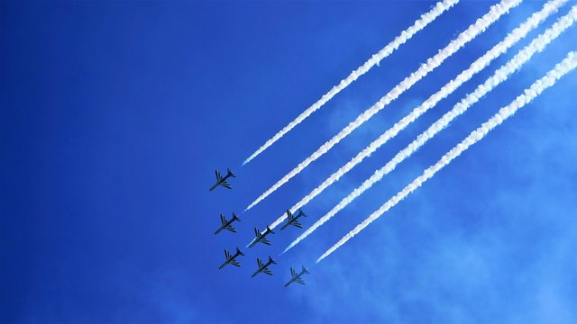 group of air jets in the sky - Powered by Adobe