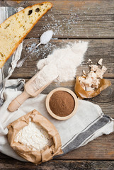 slice of bread and ingredients on old weathered wooden table