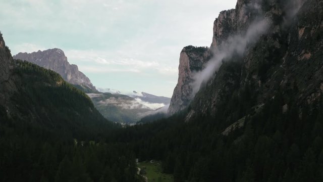 Beautiful mountain aerial view of a beautiful valley of Dolomite Alps during sunset