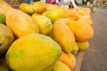 Naklejka na ściany i meble Close-up of papaya at a public market