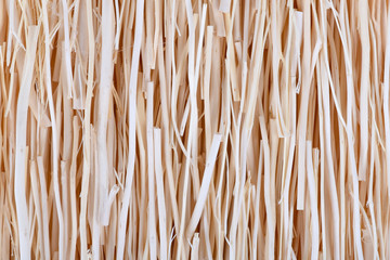 Light wooden sticks texture background.Uneven surface with natural thatch pattern and structure material.The concept of decoration, wallpaper design, calendars.