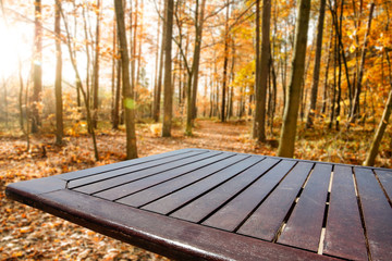 Naklejka na ściany i meble Wooden desk of free space for your decoration and autumn background. 
