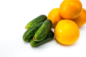 cucumbers and tomatoes isolated on white background