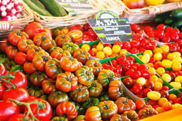 Variety of fresh organic tomatos on farmer market
