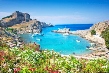 Naklejka na ściany i meble Lindos – panoramic view of St. Paul bay with acropolis of Lindos in background (Rhodes, Greece)