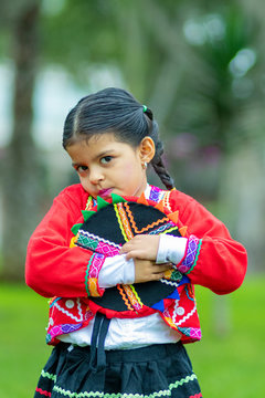 Peruvian girl dressed in typical costume of Cusco, Peru