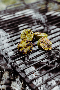 burnt limes on a barbecue