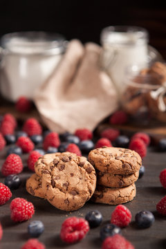 Stack of delicious and healthy chocolate cookies with dresh milk