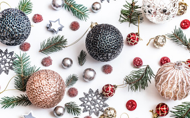 Christmas composition. Gifts, fir tree branches, red decorations on white background. Winter, new year concept. Flat lay, isometric view