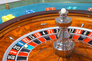 beautiful casino roulette close-up with playing chips