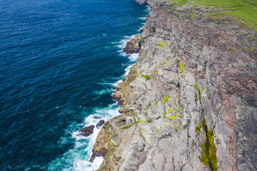 Aerial view of Koltur island in Faroe Islands, North Atlantic Ocean. Photo made by drone from...