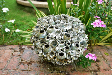 gnarled vase in garden