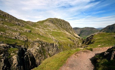 Sunlight on the track at Piers Gill