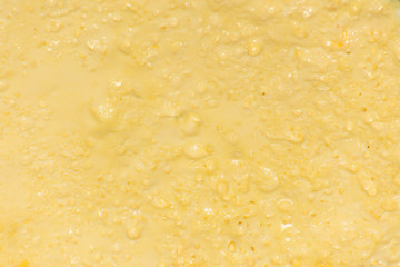 The surface of the yellow homemade omelet