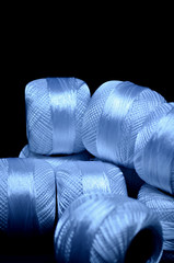 White threads. Knitting thread.