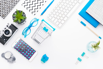 Man holds a tablet and looks at the screen. Mobile development. Innovational online businesses. Internet technologies. Trendy design. Geometry. Fashionable vibrant colors. Using a device. UX and UI.