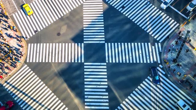 4K,Time lapse traffic and crowd people at ginza district intersection in Tokyo of Japan