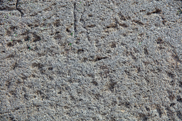 Texture of the coarse grey granular wall