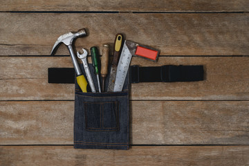 old instruments constructor or renovation for build and repair house on wooden background