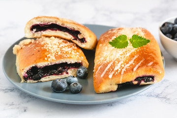 Traditional polish yeast cake with blueberries (jagodzianka).