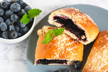 Traditional polish yeast cake with blueberries (jagodzianka).