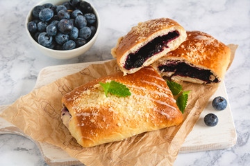Traditional polish yeast cake with blueberries (jagodzianka).
