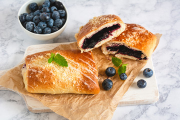 Traditional polish yeast cake with blueberries (jagodzianka).