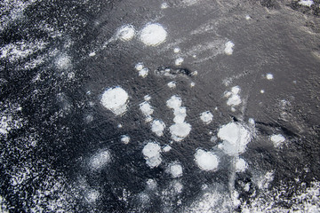 Air bubbles in the frozen water
