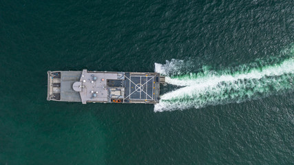 Aerial view navy military ship in the open sea, Aerial view amphibious ship transport.
