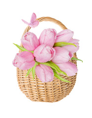 Pink tulips flowers in wattled basket