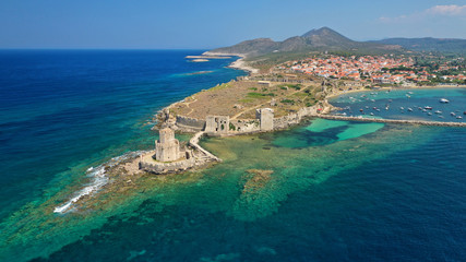 Aerial drone panoramic view of iconic Venetian castle of Methoni and Bourtzi tower on the southwest cape of Messinia, Peloponnese, Greece