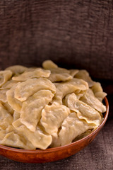 cooked dumplings in a large plate close-up