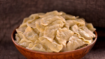 cooked dumplings in a large plate close-up