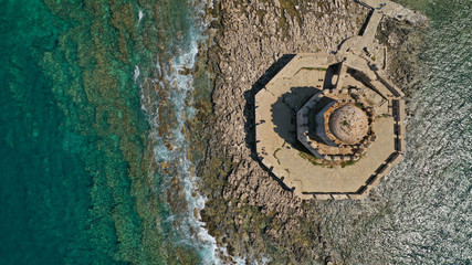 Aerial drone panoramic view of iconic Venetian castle of Methoni and Bourtzi tower on the southwest cape of Messinia, Peloponnese, Greece